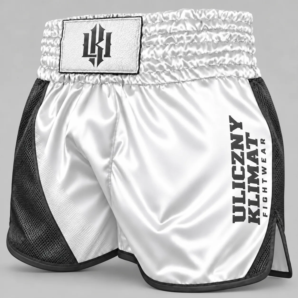 Białe spodenki muay thai z czarnymi bokami Uliczny Klimat
